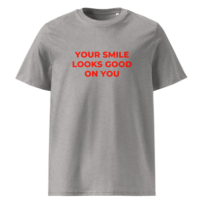 Your Smile Looks Good on You organic graphic T-shirt with positive quote printed on front in minimalist design